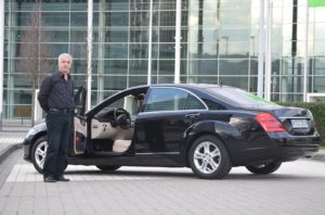 limo-driver-and-limousine